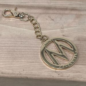 MIAK Collection 5.5” Gold Tone Logo Bag Charm Lobster Claw